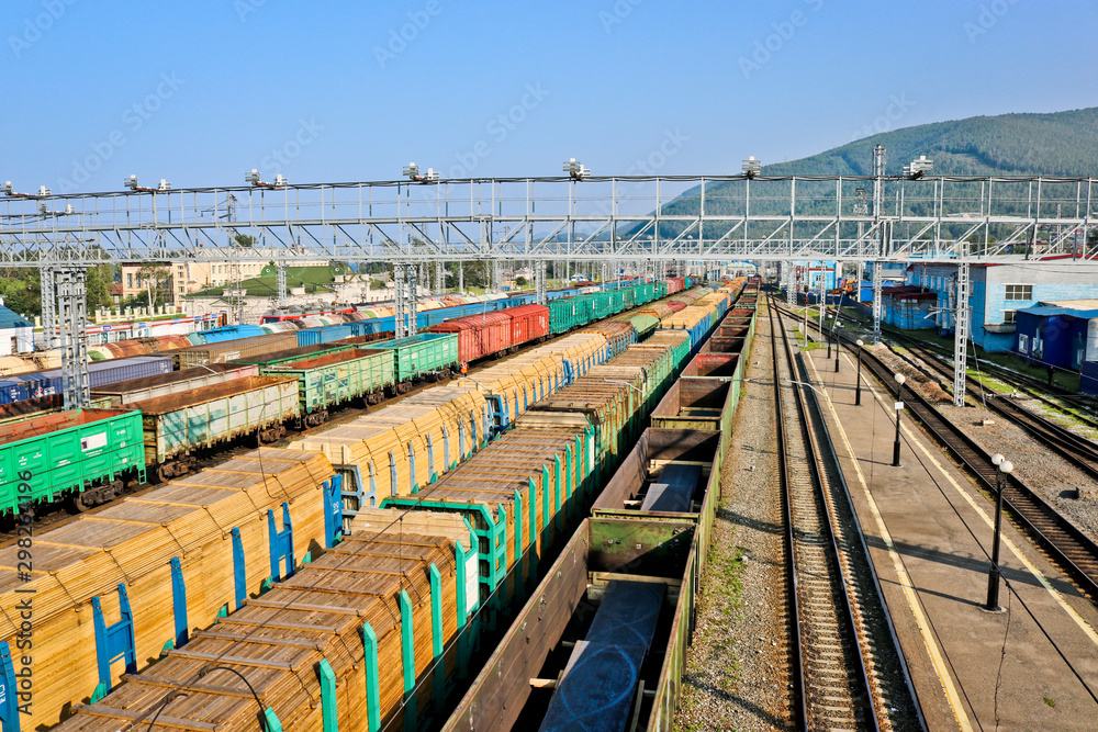 Freight trains at the railway sorting station. Rail Cargo transit. View from above.