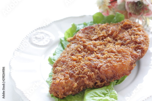 Japanese food, pork cutlet on lettuce with copy space