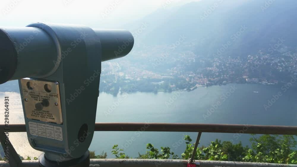 view of the como lake from alessandro volta lighthouse with spyglass and camera pan to right