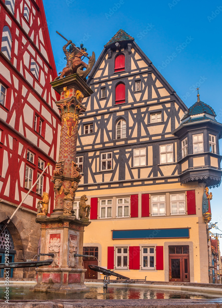 Georges spring pillar and Half-timbered houses at Marktplatz Rothenburg ob der Tauber Old Town Bavaria Germany