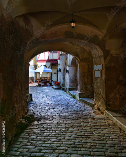Fototapeta Naklejka Na Ścianę i Meble -  Ancient narrow street  in old medieval town 