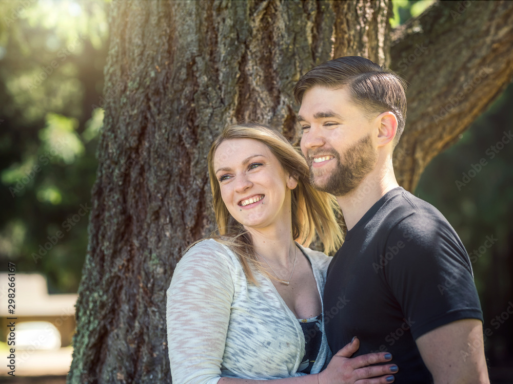 A romantic couple enjoying an afternoon in the woods. A romantic couple enjoying an afternoon in the woods.