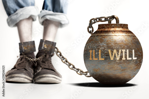 Ill will can be a big weight and a burden with negative influence - Ill will role and impact symbolized by a heavy prisoner's weight attached to a person, 3d illustration photo