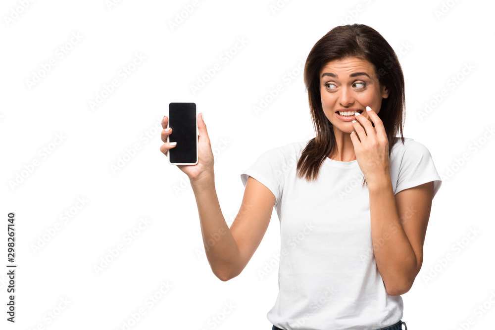 beautiful surprised woman showing smartphone with blank screen, isolated on white beautiful surprised woman showing smartphone with blank screen, isolated on white