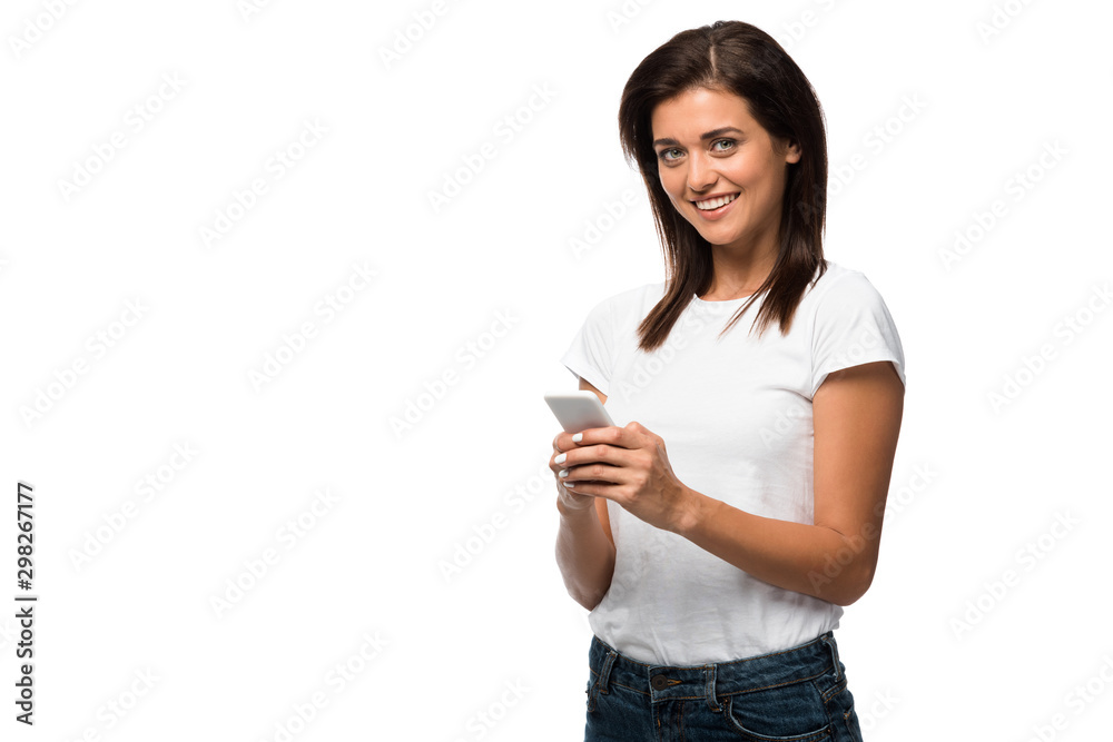 smiling young woman using smartphone, isolated on white smiling young woman using smartphone, isolated on white