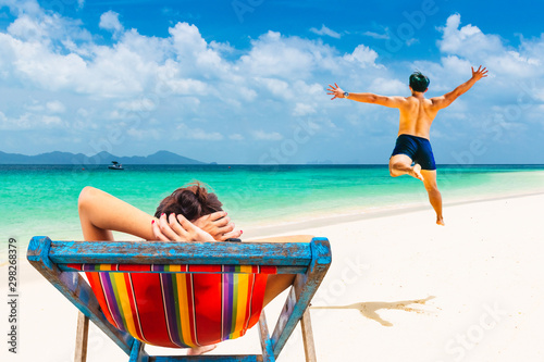 Activity summer lifestyle couple traveler joy relaxing on tropical white sand beach, Attraction scenic tourist travel Phuket Thailand fun beach Tourism beautiful destination Asia holiday vacation trip