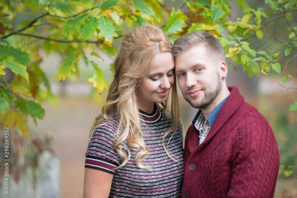 Fototapeta premium A portrait of young married couple expecting a baby