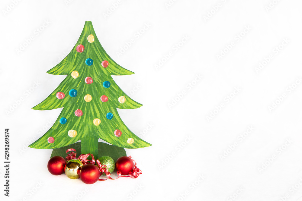Beautiful hand-painted Christmas tree with colorful balls isolated on white background. Copy space and selective focus. Concept of merry christmas, holidays, happy new year, happiness and celebration. Beautiful hand-painted Christmas tree with colorful balls isolated on white background. Copy space and selective focus. Concept of merry christmas, holidays, happy new year, happiness and celebration.