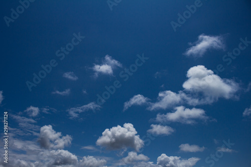 White clouds over a blue sky. Storm Cumulonimbus.