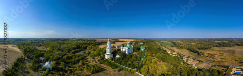 Aerial panorama view of Orthodox Monastery With Green Domes in Ukraine.