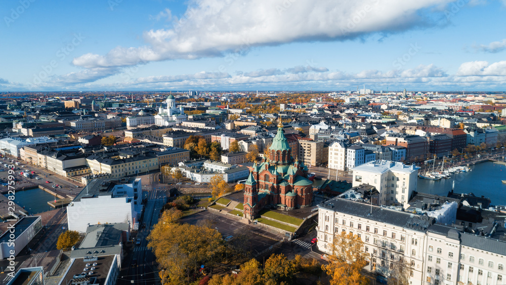 Fototapeta premium Assumption Cathedral in a wonderful autumn day.Scenic summer panorama of the Old Town with Uuspenski orthodox cathedral church and old port in Katajanokka district in Helsinki, Finland