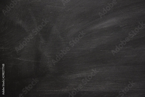 Fototapeta Abstract texture of chalk rubbed out on blackboard or chalkboard background, can be use as concept for school education, dark wall backdrop , design template , etc