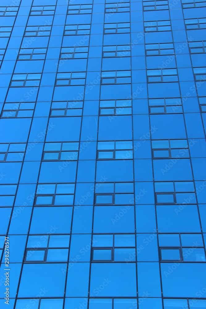 high modern skyscraper with a lot of windows high modern skyscraper with a lot of windows