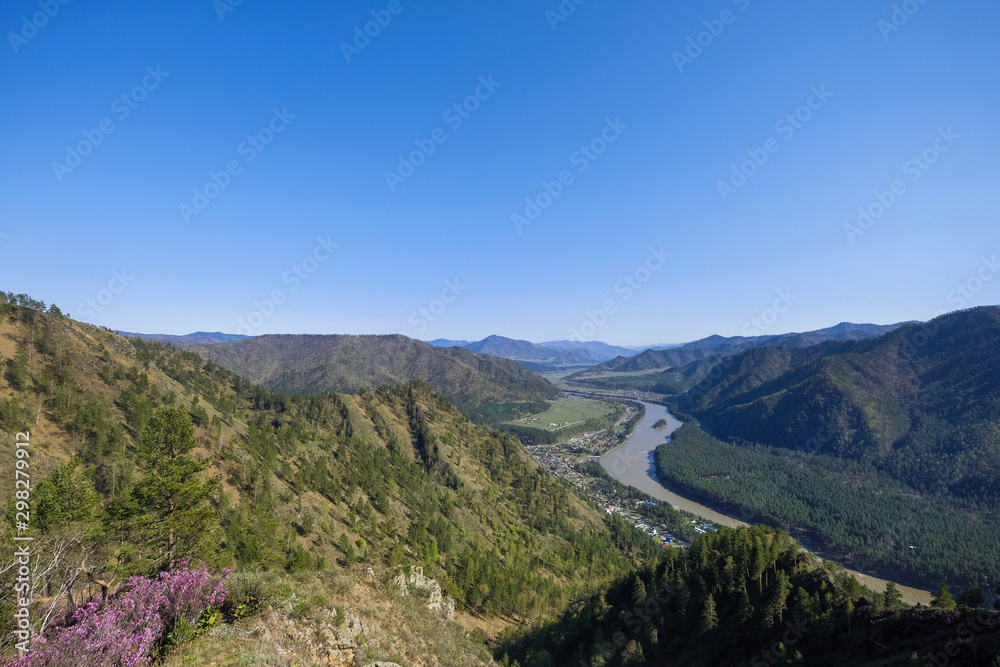 Mountain landscape with the peak of the cliff. Summer landscape of the Altai mountains. Mountain landscape with the peak of the cliff. Summer landscape of the Altai mountains.
