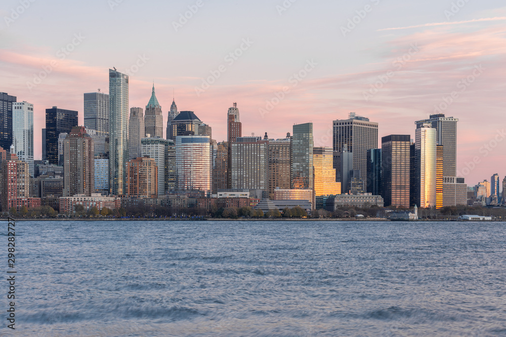 Sunset and night view of Manhattan, cityscapes of New York, USA