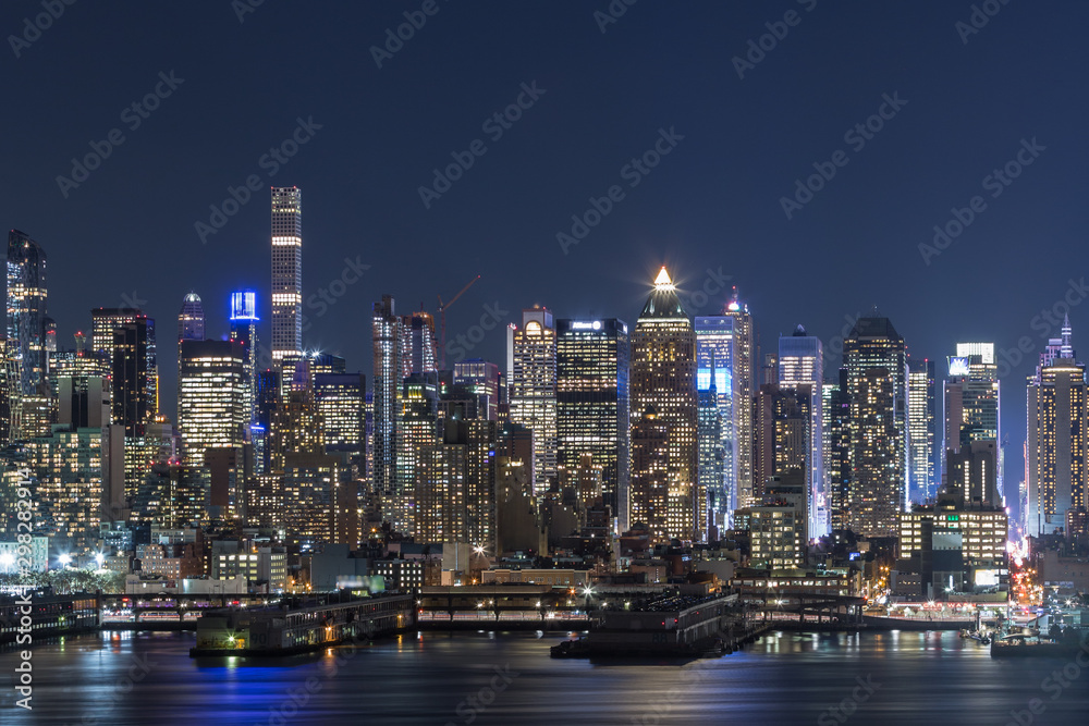Sunset and night view of Manhattan, cityscapes of New York, USA Sunset and night view of Manhattan, cityscapes of New York, USA