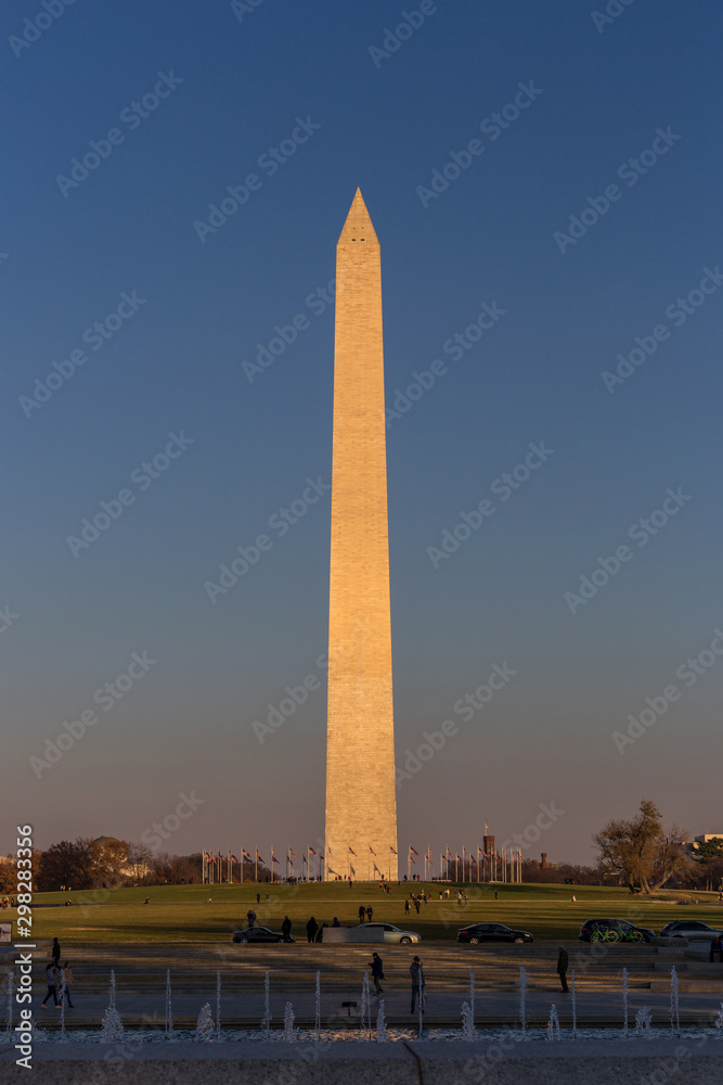Sunset view of the Washington Monument with golden sunlight