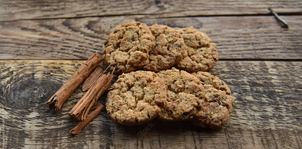 Fototapeta premium traditional chocolate chip cookies on wooden boards
