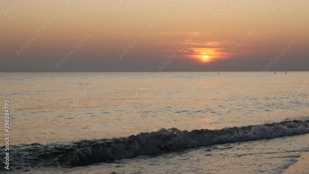 Sun behind clouds on horizon before sunrise 4K video Sun behind clouds on horizon before sunrise 4K video