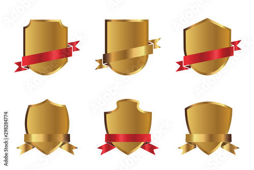 Set of golden shields and red ribbons. Vector Illustration. photo