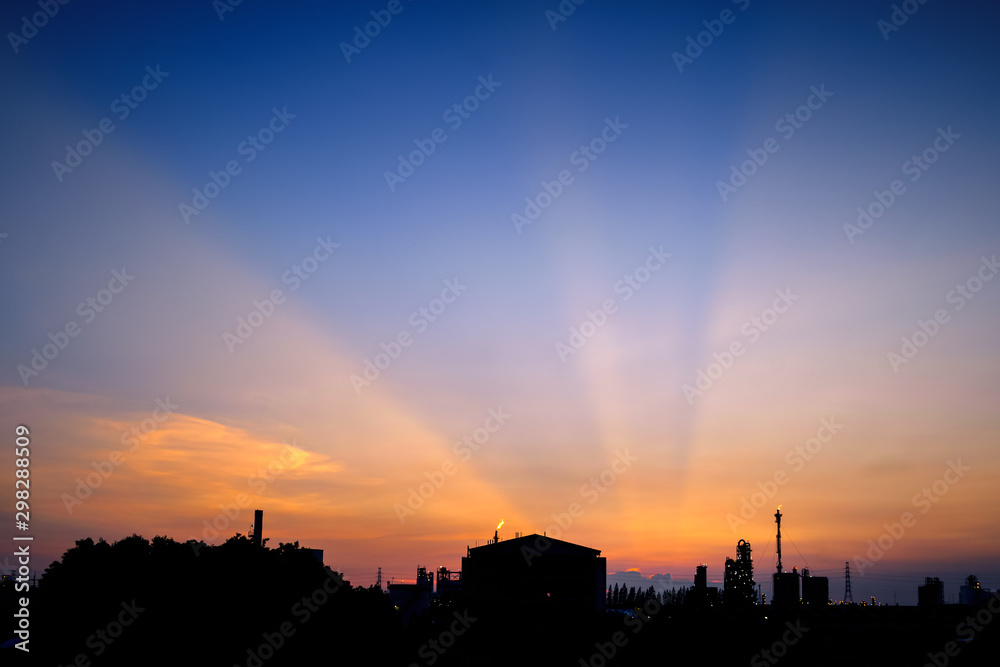 Silhouette of petrochemical industrial estate with sunset sky background