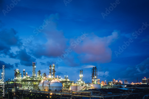 Oil and gas refinery plant or Petrochemical industrial plant on blue sky with cloud background, Factory of petroleum with dawn sky