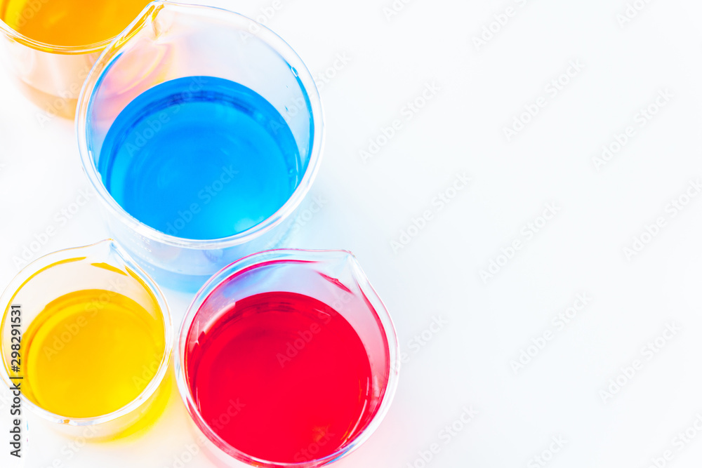 Glass beakers of various sizes in a science laboratory Used for adding chemical fluids to experiment About doing research for science Glass beakers of various sizes in a science laboratory Used for adding chemical fluids to experiment About doing research for science