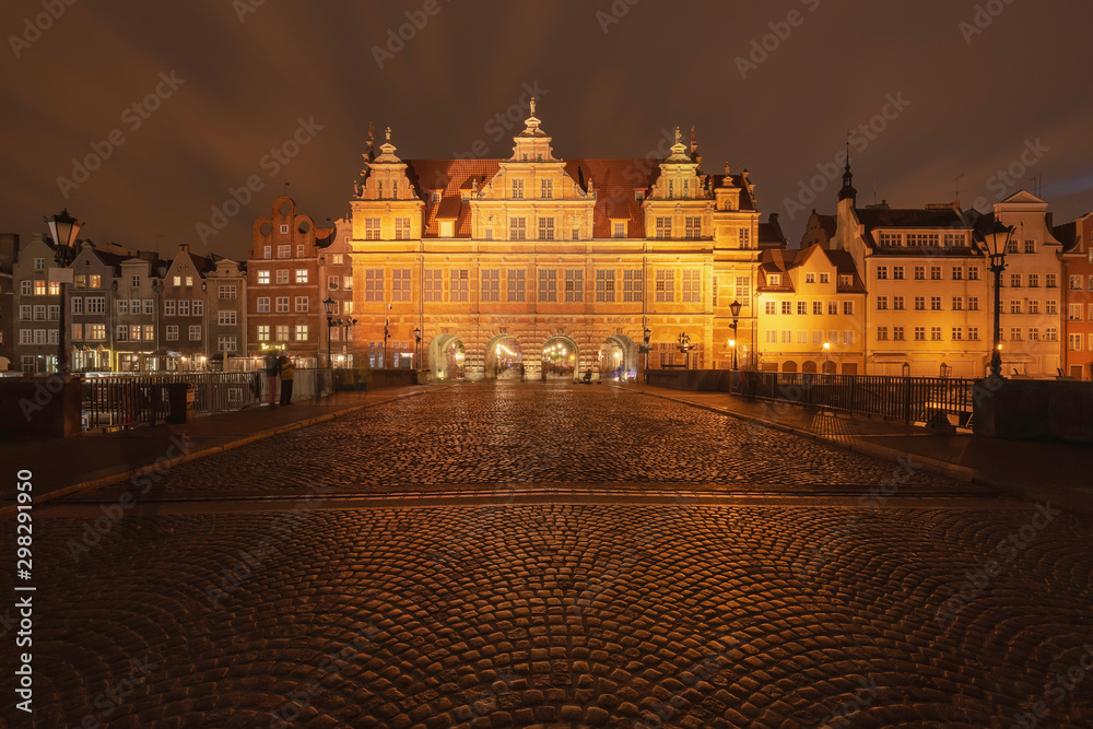 Evening streets of old Gdansk, bridge over the main river, central tourist street called long market.