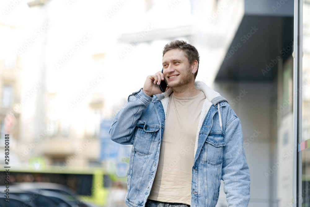 young man talking on the phone young man talking on the phone