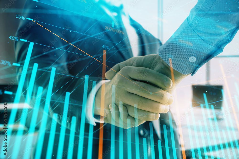 Multi exposure of financial graph on office background with two businessmen handshake. Concept of success in business Multi exposure of financial graph on office background with two businessmen handshake. Concept of success in business