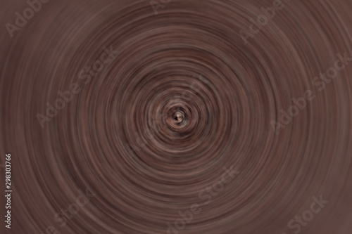 Blurred radial motion gravel dark red background. Circular texture © MariiaDemchenko