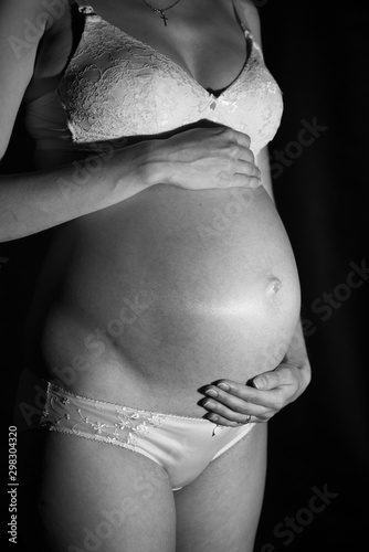 Woman with pregnant belly in 9 month. Pregnancy concept.