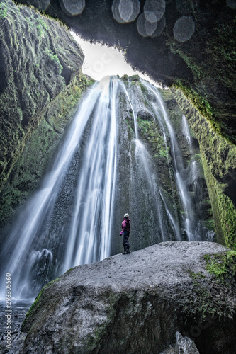 stunning view of the Gljurar Foss cascade inside a cavern in south western Iceland