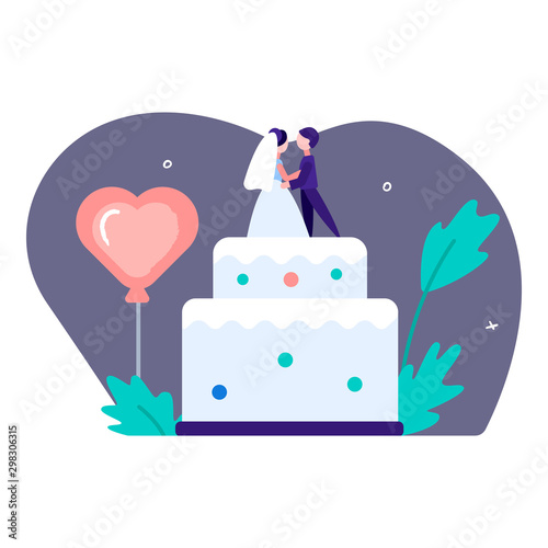 Figures of the bride and groom are dancing waltz on a wedding cake. Bridal table with decorations.