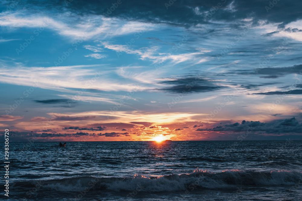 Amazing colorful sunset with deep blue sky on the beach in Sri Lanka island