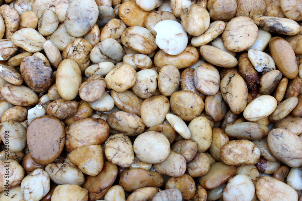 Brown sea pebbles as a background