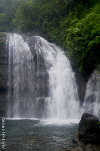 Waterfall of  the hills of Shillong in Meghalaya  silky blur water and natural surroundings with trees.