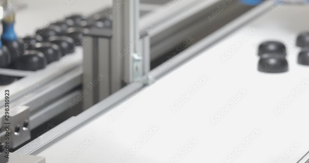 Robotic Arm With Vacuum Suction Cups at Conveyor Belt