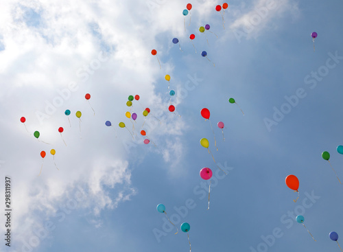 background of blue sky with many balloons