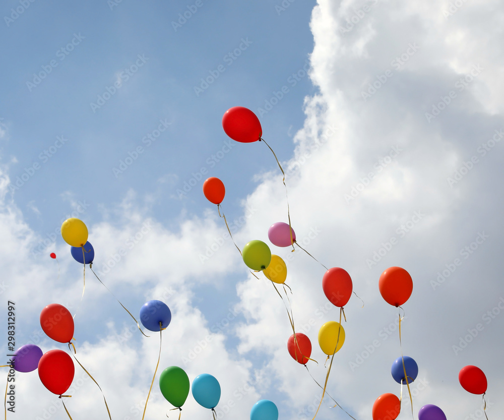 colored balloons on the blue sky with clouds colored balloons on the blue sky with clouds