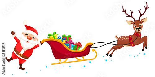 Santa Claus holding one hand on the sleigh with gifts and waving. Christmas characters photo