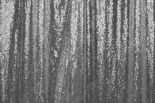 Sequin curtain. A silver cusrtain made from sequins for photo props background.