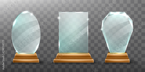 Glass trophy or winner award realistic vector illustration. Transparent crystal plate or blue acrylic frame different shapes on wooden pedestal, isolared front view with light and shadow