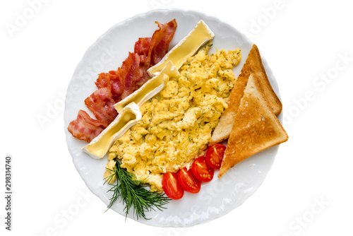 Omelet with bacon, tomatoes, cheese and toast isolated on white. Top view.