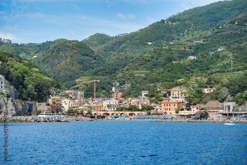 Fototapeta Naklejka Na Ścianę i Meble -  Sea bay with beach, mountain and village view in Cinque Terre, Italy