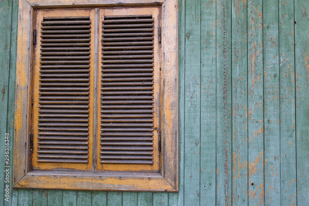 old window on wooden background
