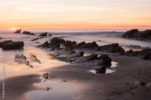 Sunset in Barrika beach, Basque country © urdialex