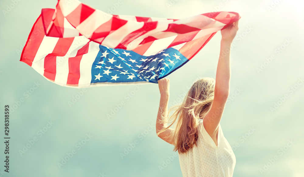 country, patriotism, independence day and people concept - happy smiling young woman in white dress with national american flag outdoors - obrazy, fototapety, plakaty 