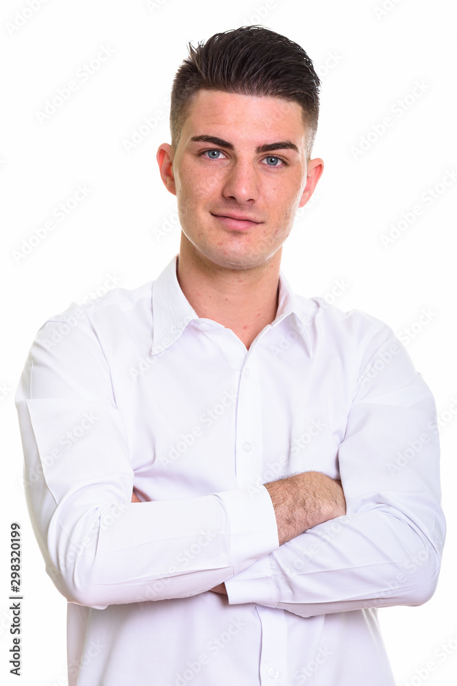 Close up of young handsome man with arms crossed Close up of young handsome man with arms crossed