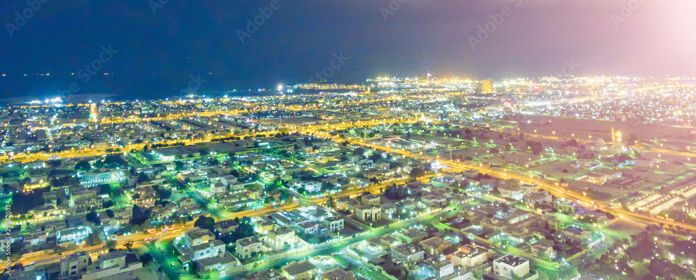 Aerial view of Dubai buildings at night, United Arab Emirates